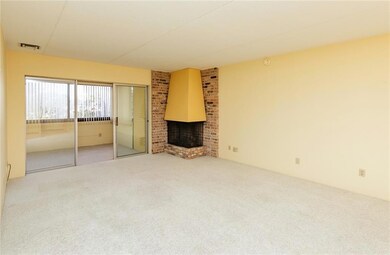 Living room with wood burning fireplace