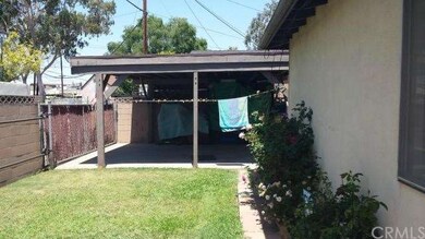 Rear unit back yard and private parking/patio