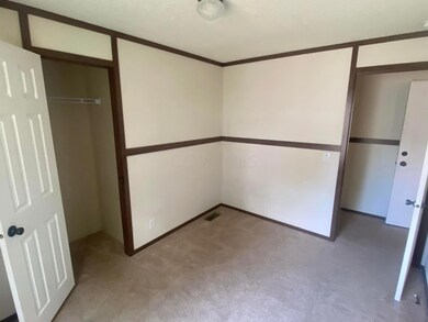 smaller bedroom 210