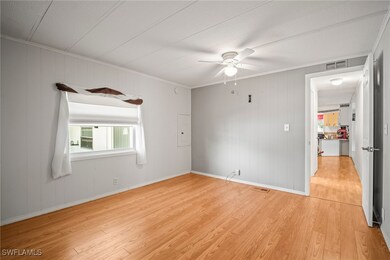 Unfurnished room featuring light wood-type floorin
