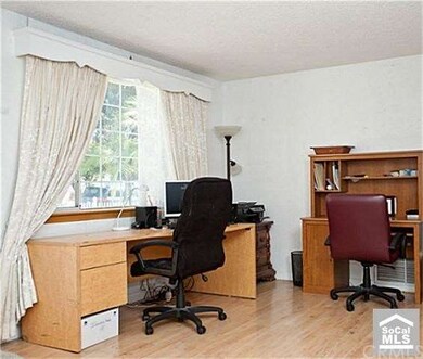 Front den that can be an office or formal living s