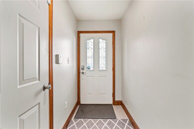Entry way with access to the garage