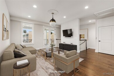 Living area featuring wood finished floors, recess