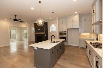 Welcome home to Evanshire! This kitchen creates a 