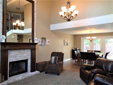 Beautiful open concept and vaulted ceilings grace 
