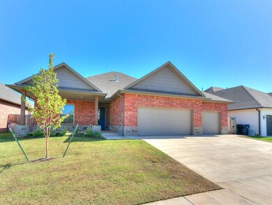 View of front of home featuring a garage and a fro