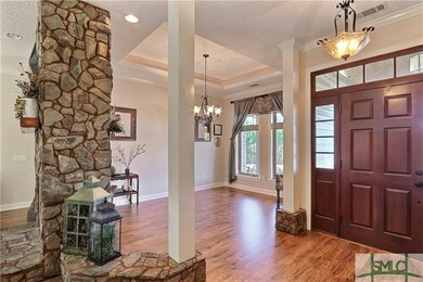 Fomal Dining Room with Cove Lighting shares Stone 