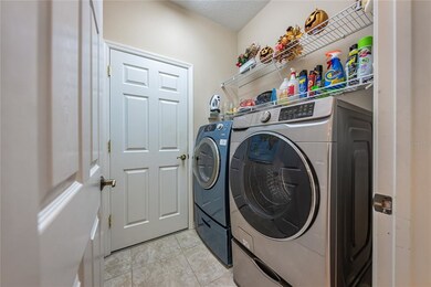 Laundry Room Leads to Garage