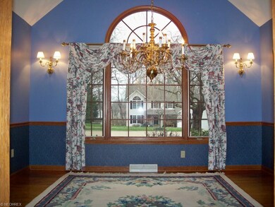 Formal Dining room with hardwood flooring, french 