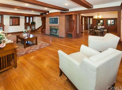 Living room w/ brick fire place 