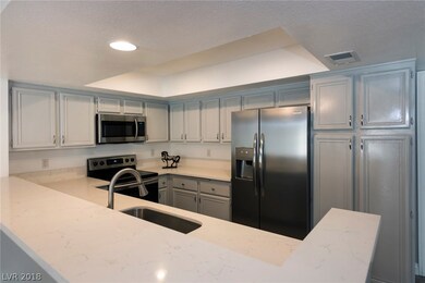 Stunning quartz counter tops, new refrigerator, di