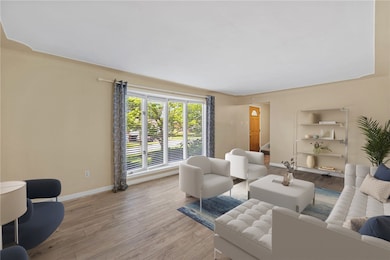 Natural light streams through the floor to ceiling
