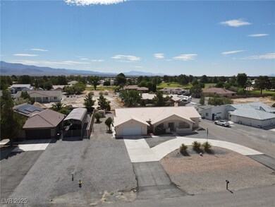 Aerial view of residential area featuring mountain