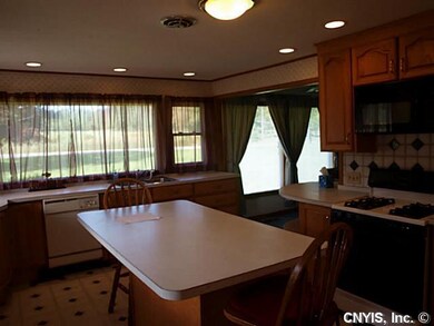 Kitchen. Spacious kitchen has island  and SO MANY 