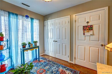 Sliding door to front deck, laundry closet + pantr