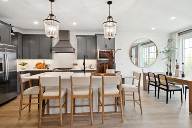 Kitchen with pendant lighting over island