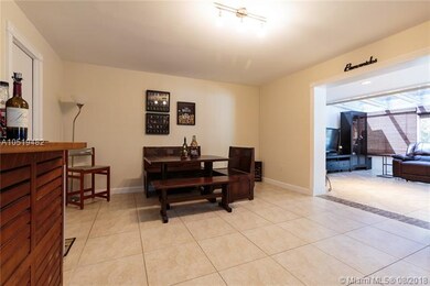 Entertaining area, connected to the sunroom.