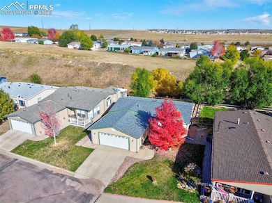 7711 Grizzly Bear Point, Colorado Springs, CO 80922 - photo 5