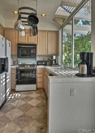 Kitchen features instant hot/cold filtered water d