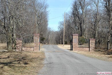 Gated Entrance to Redbud Cottage Colony