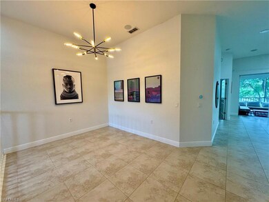 Spare room with light tile patterned floors and a 