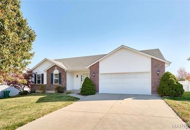 Single story home with roof with shingles, a front lawn, driveway, and brick siding