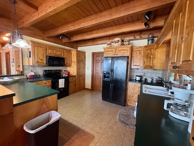 63309 E 246 Ln, Wyandotte, OK 74370 - photo 7