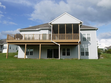 back of house with deck/screen porch