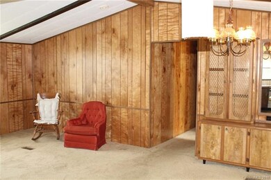 Another view of the Great Room and Dining Room with Built Ins