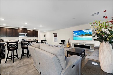 Living room with recessed lighting and light color