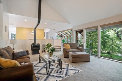Living Area w/ library-dining-sunroom-wet bar. Vau