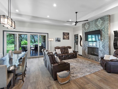 Living room with recessed lighting, a premium fir