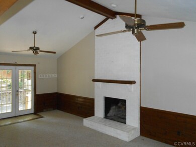 Great room with brick fireplace, cathedral ceiling
