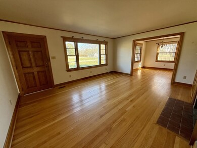 Spacious living room with lots of natural light.