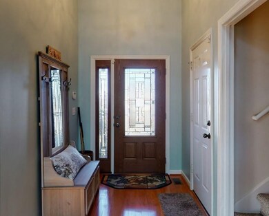 As you enter the home you are greeted by soaring c