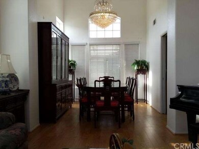 Dining Room With High Ceiling