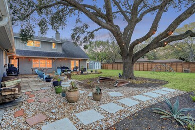 Come relax in this amazing backyard under the oak tree.