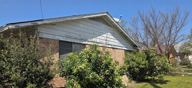 View of home's exterior with brick siding
