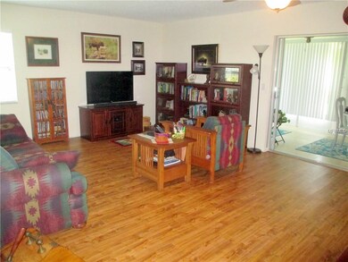 Very spacious living area opens to a wall of windo