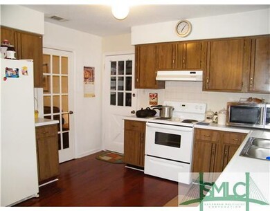 Kitchen. Door to Living Room & Garage