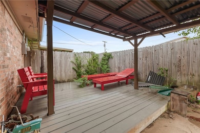 Deck featuring a fenced backyard