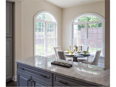 Kitchen looking toward Breakfast Room with surroun