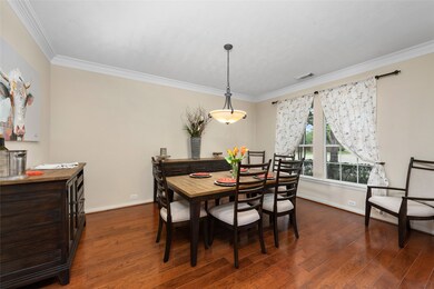 To the right of the entry foyer is the formal dining room. This space overlooks the front yard, and is scaled to allow for large gatherings. This space can accommodate seating for 8-1o with serving and storage furnishings. The triple crown moulding in this room echoes that seen in the office.