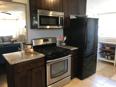 Kitchen has been upgraded with modern appliances, 