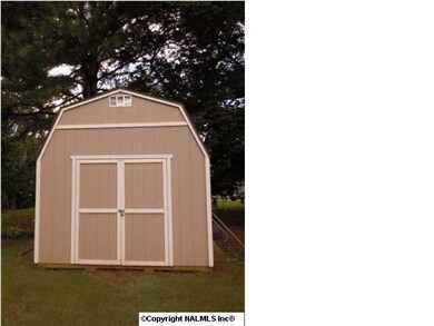 MUST SEE THE INSIDE OF THS OUTDOOR BUILDING-TONS OF ROOM FOR ALL YOUR ODDS AND INS!