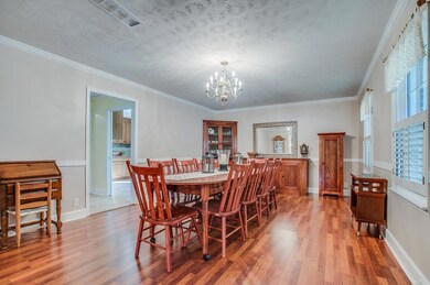 Formal dining room is large enough to be living room & dining room.