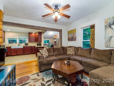 The open floor plan of the kitchen, living and din