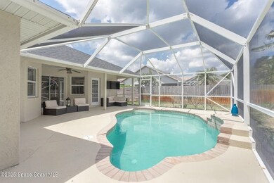 View of swimming pool with a patio area, an outdoor living space, a sunroom, glass enclosure, and a ceiling fan