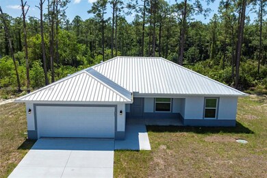 2004 Rosa Ct, Lehigh Acres, FL 33972 - photo 2