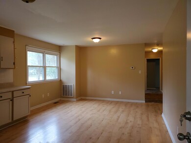 Huge Dining Area with many windows and view of backyard
